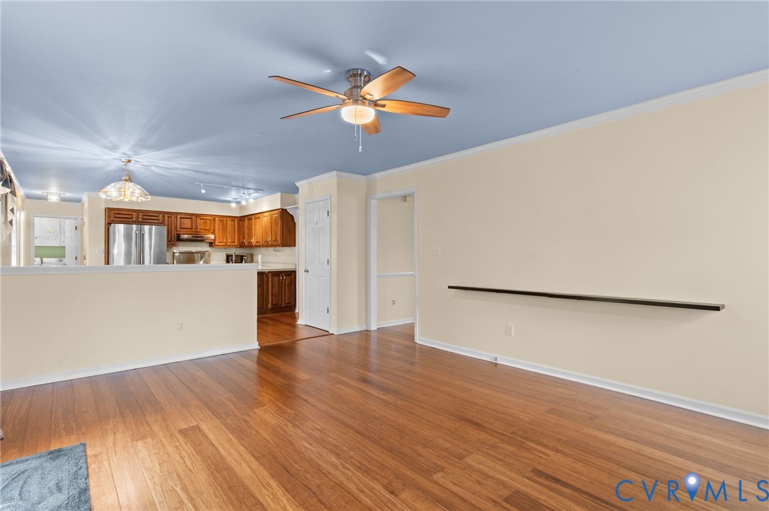 3440 Hunter's Ridge Williamsburg, VA 23188 - Photo 3 of 30 Unfurnished living room featuring light wood finis