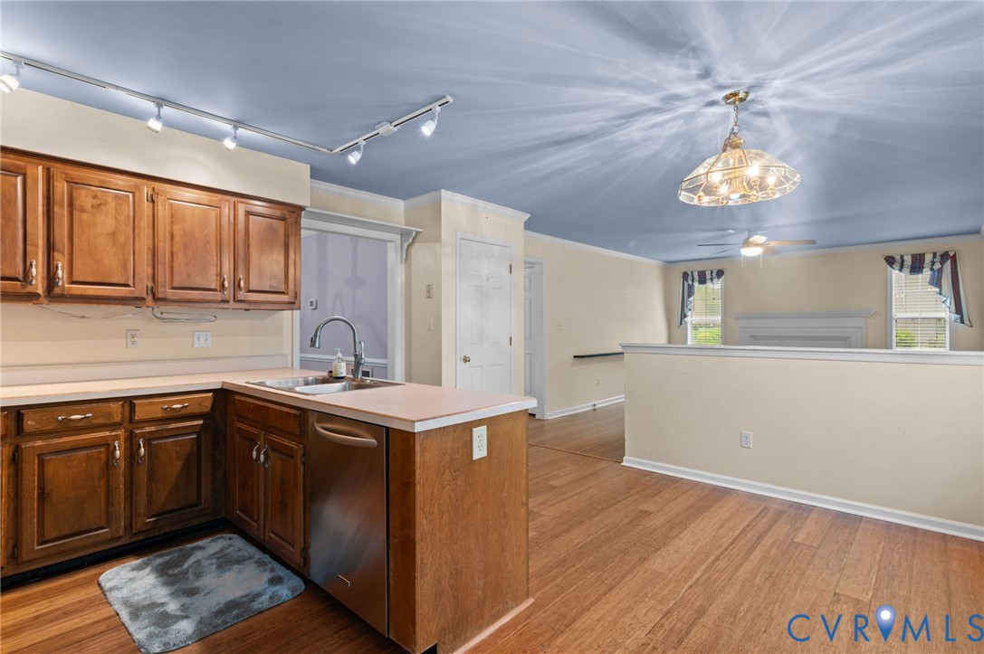 3440 Hunter's Ridge Williamsburg, VA 23188 - Photo 8 of 30 Kitchen featuring a peninsula, light countertops,