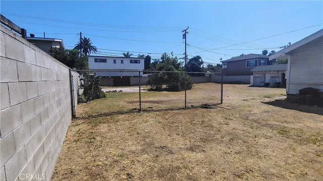 a view of a backyard of a house