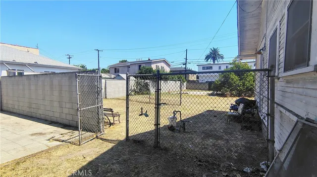a view of a deck with a backyard