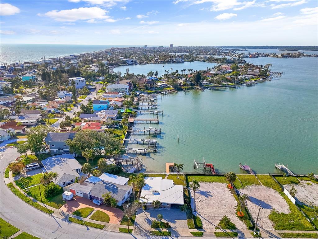 15305 Harbor Drive Madeira Beach, FL 33708 - Photo 11 of 16 an aerial view of a houses with a lake