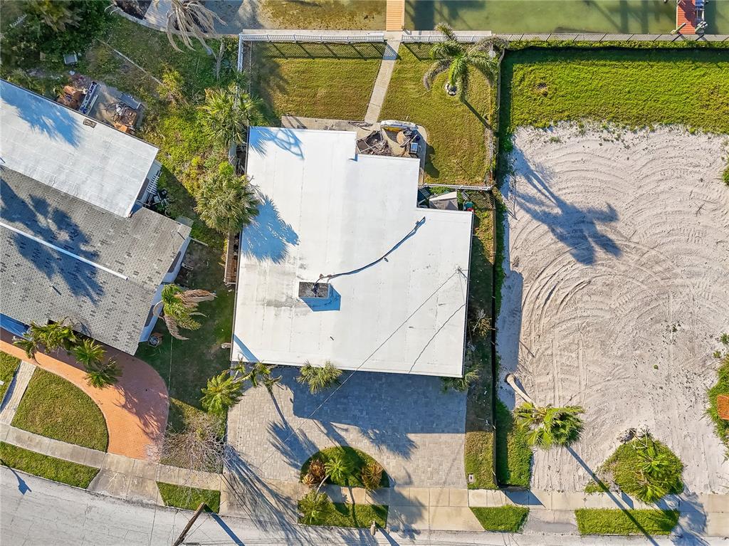 15305 Harbor Drive Madeira Beach, FL 33708 - Photo 5 of 16 an aerial view of a house with a swimming pool