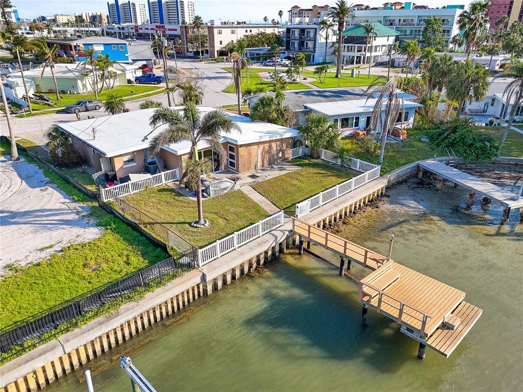 15305 Harbor Drive Madeira Beach, FL 33708 - Photo 6 of 16 an aerial view of a house with swimming pool and outdoor seating