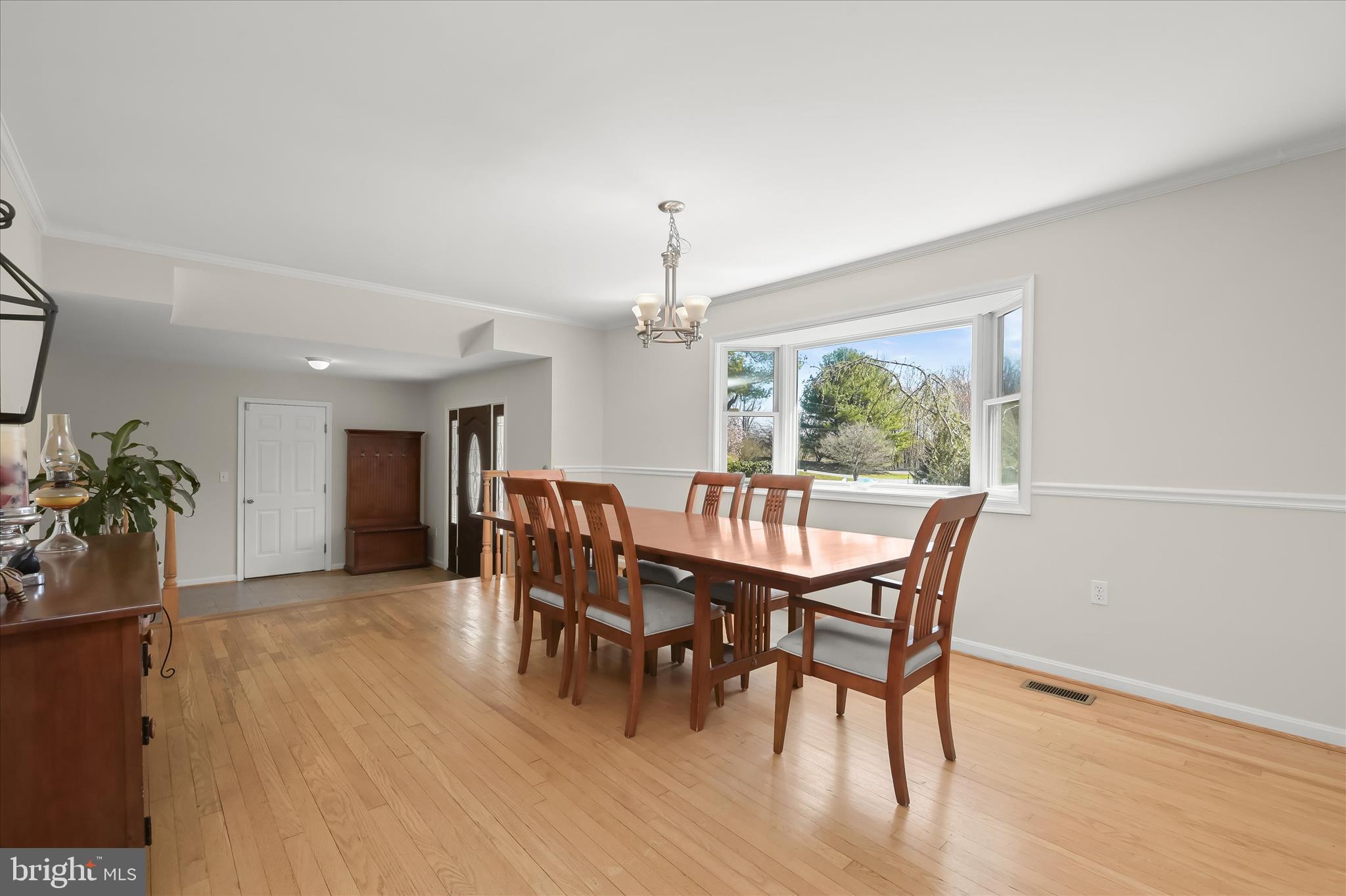 6910 Pindell School Road Clarksville, MD 21029 - Photo 11 of 73 a dining room with furniture window and wooden floor