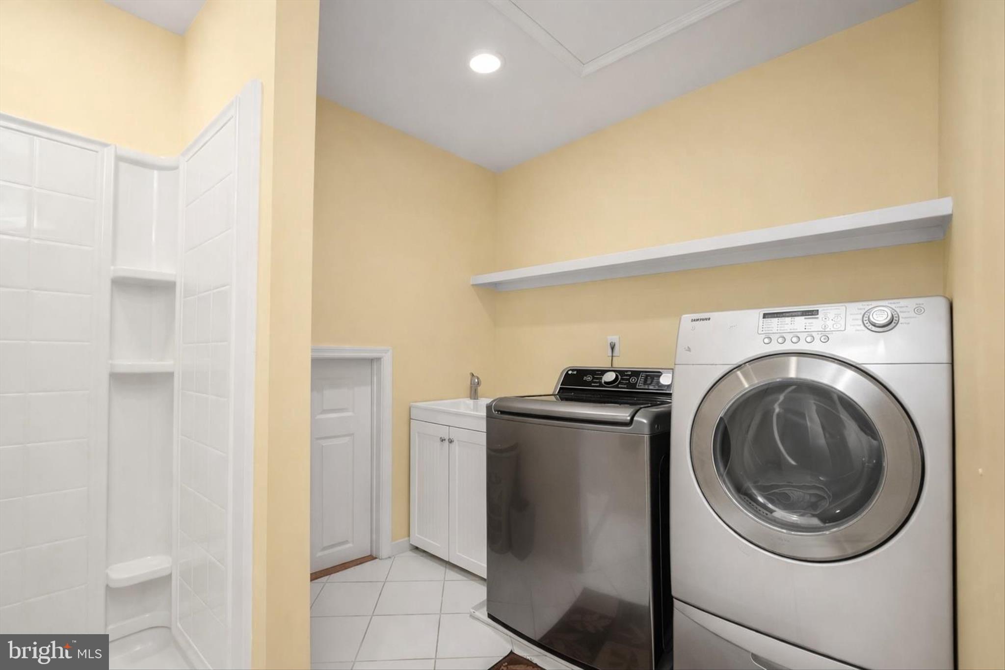6910 Pindell School Road Clarksville, MD 21029 - Photo 28 of 73 a utility room with dryer and washer