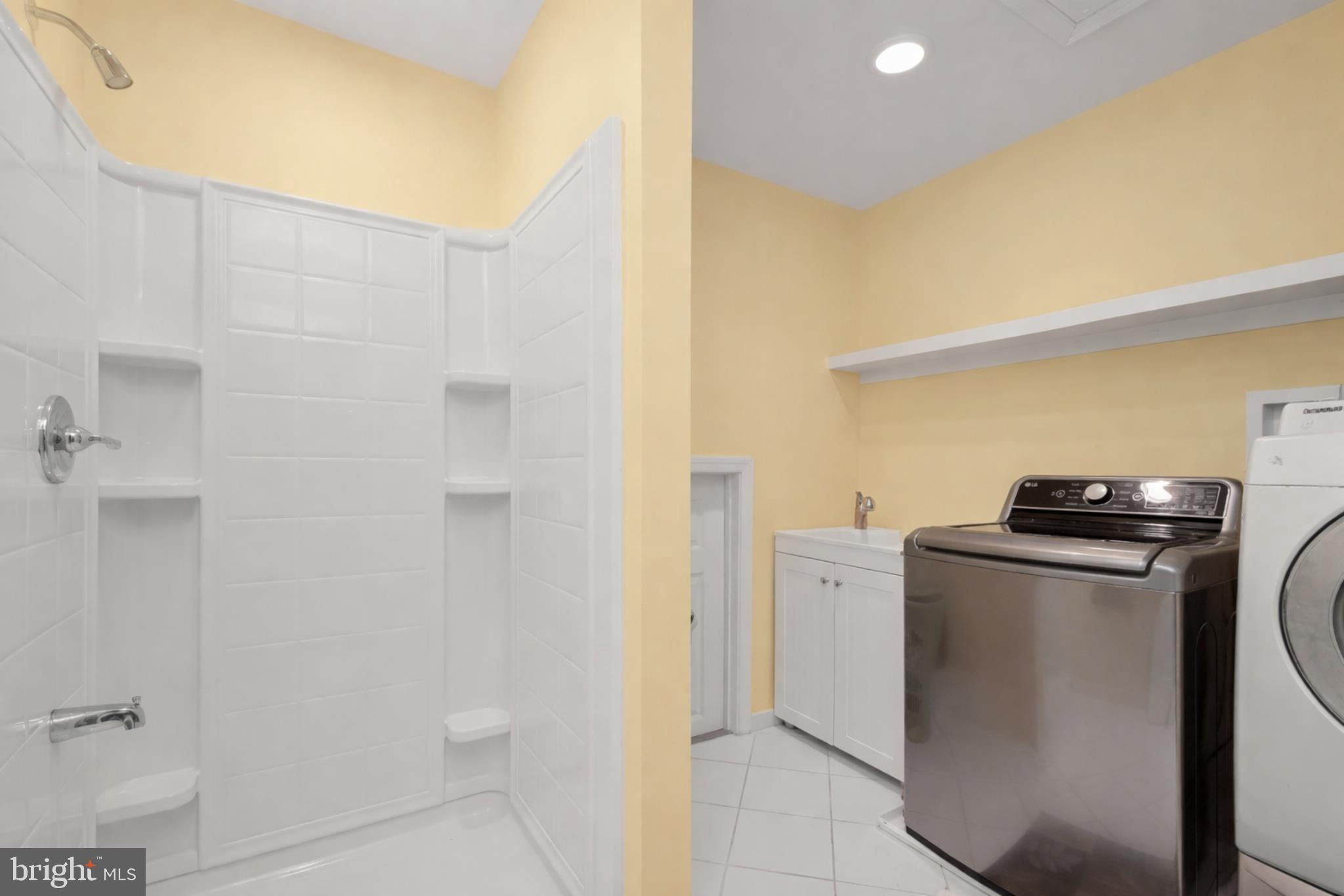 6910 Pindell School Road Clarksville, MD 21029 - Photo 29 of 73 a view of a storage & utility room with a sink