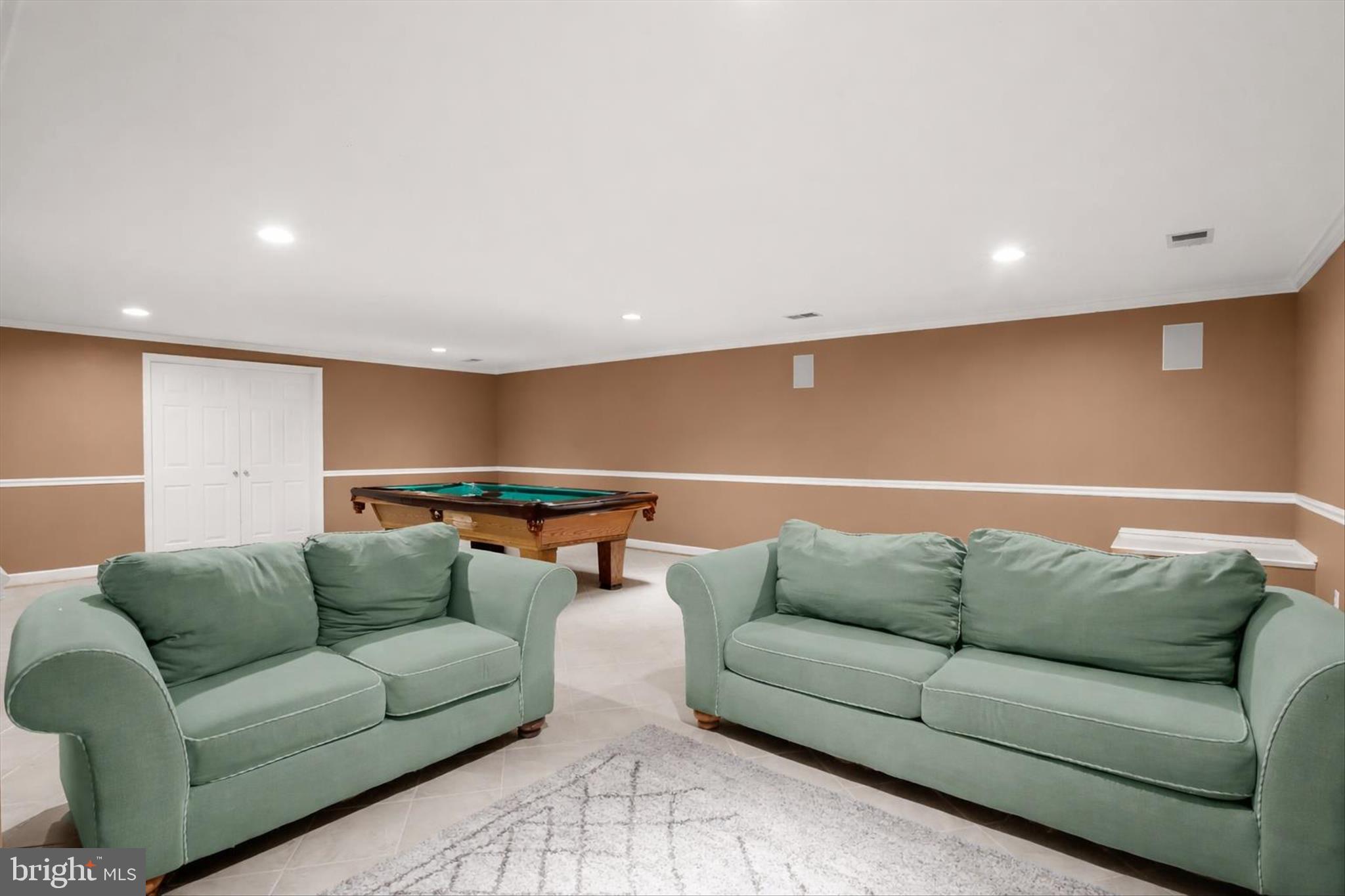 6910 Pindell School Road Clarksville, MD 21029 - Photo 50 of 73 a living room with furniture and a couch