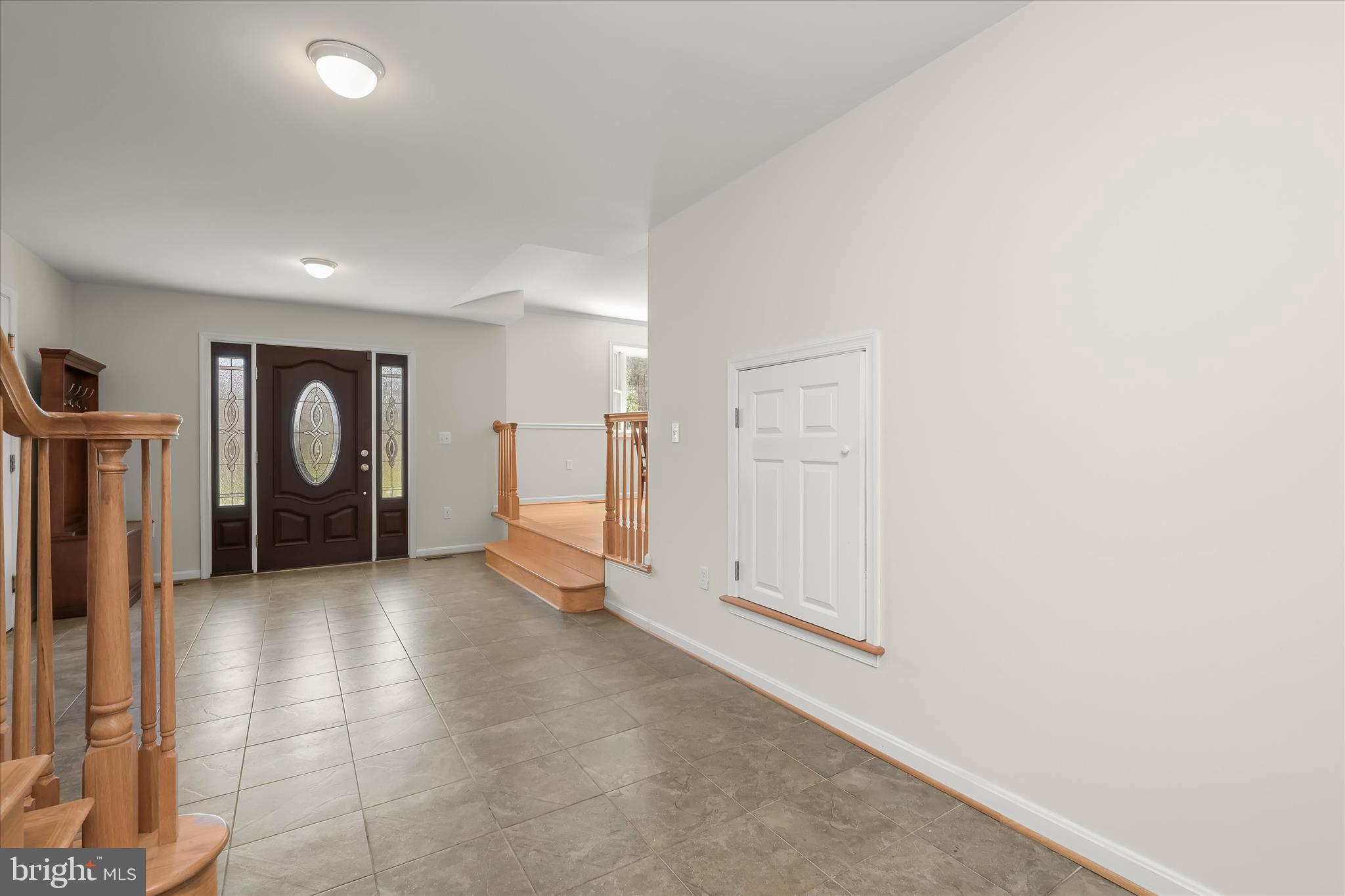 6910 Pindell School Road Clarksville, MD 21029 - Photo 5 of 73 Foyer Features Sidelights and Ceramic Tile Floor