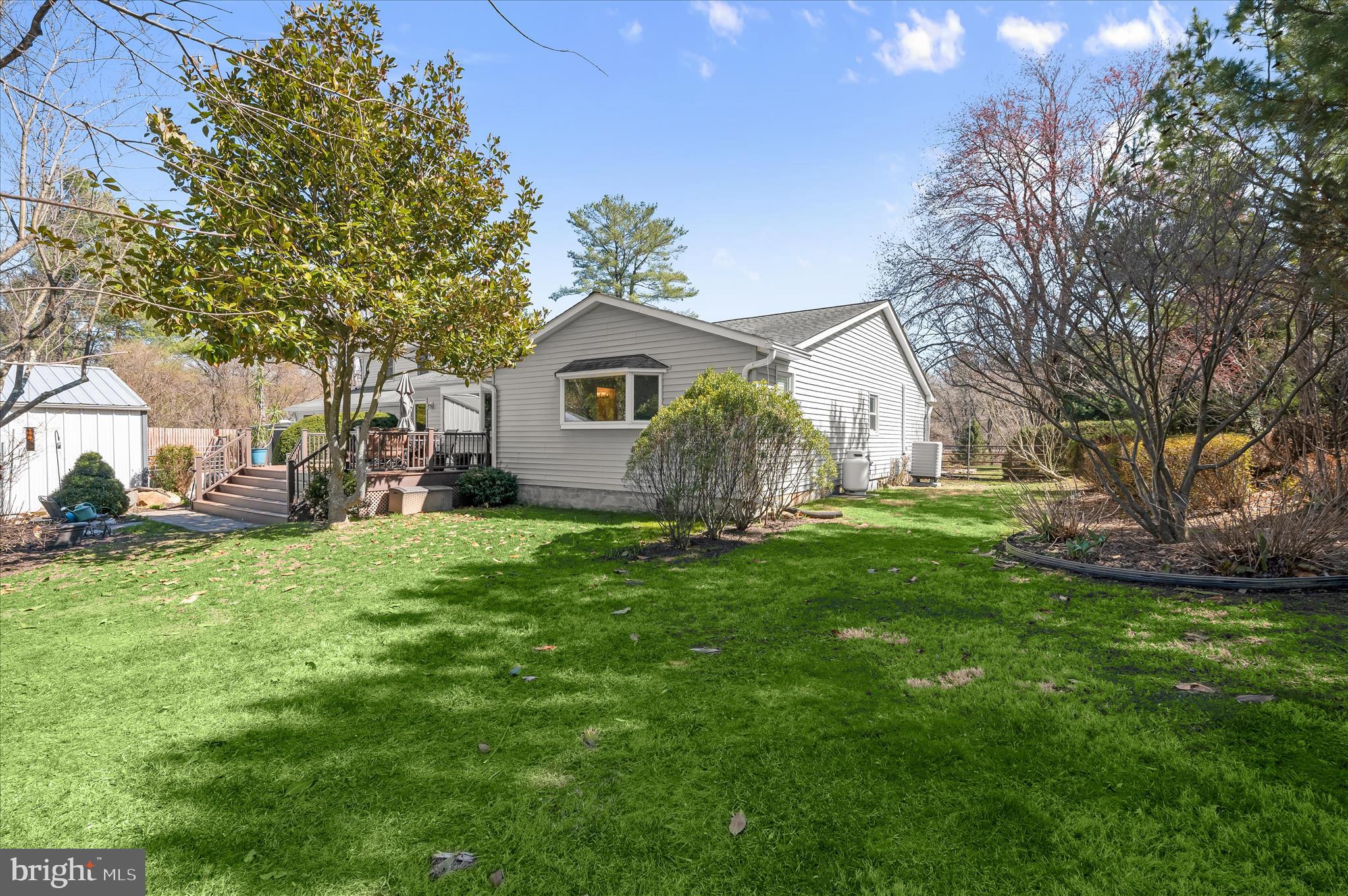 6910 Pindell School Road Clarksville, MD 21029 - Photo 60 of 73 a front view of house with yard and green space