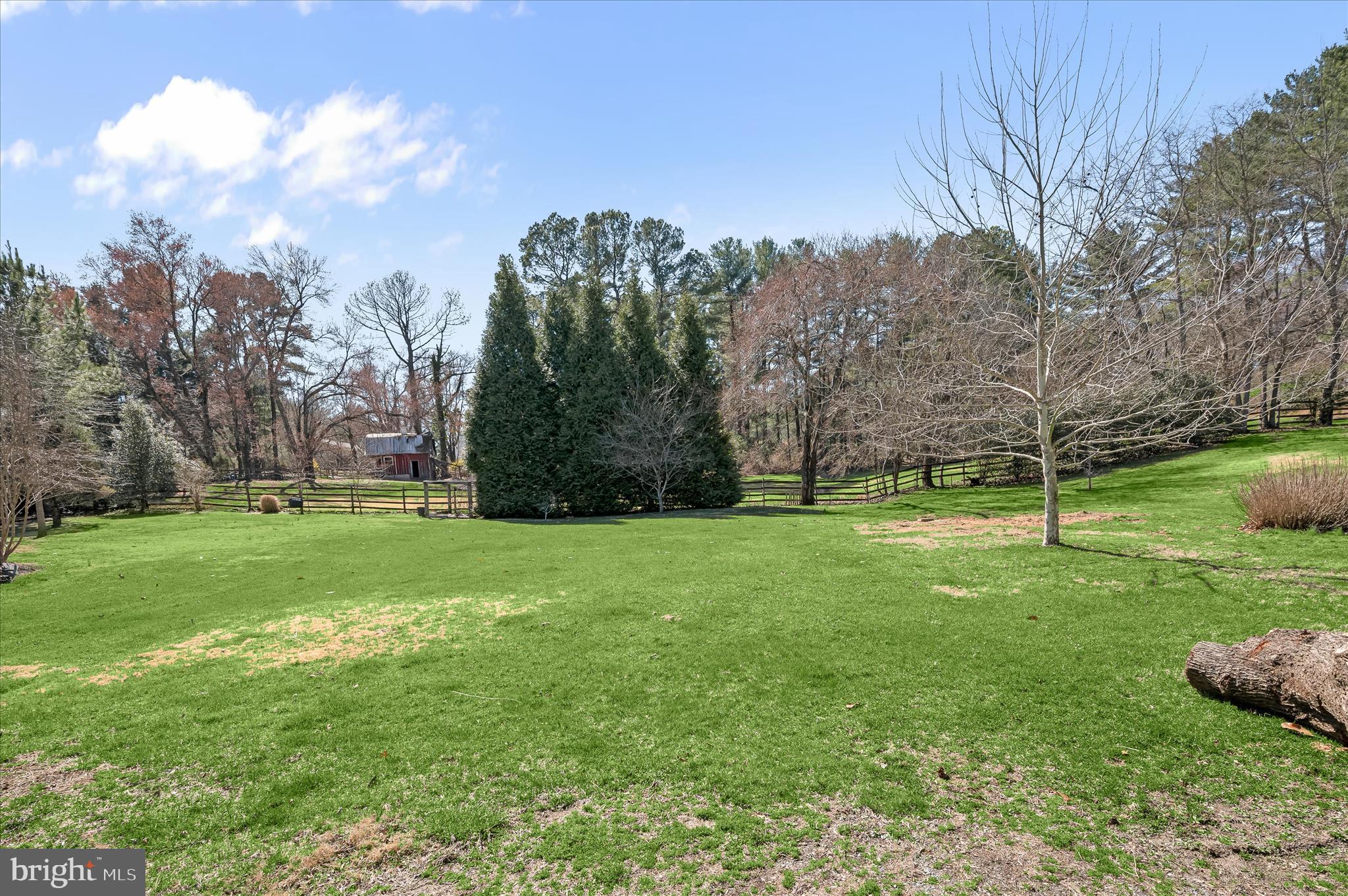 6910 Pindell School Road Clarksville, MD 21029 - Photo 64 of 73 a view of a field of grass and trees