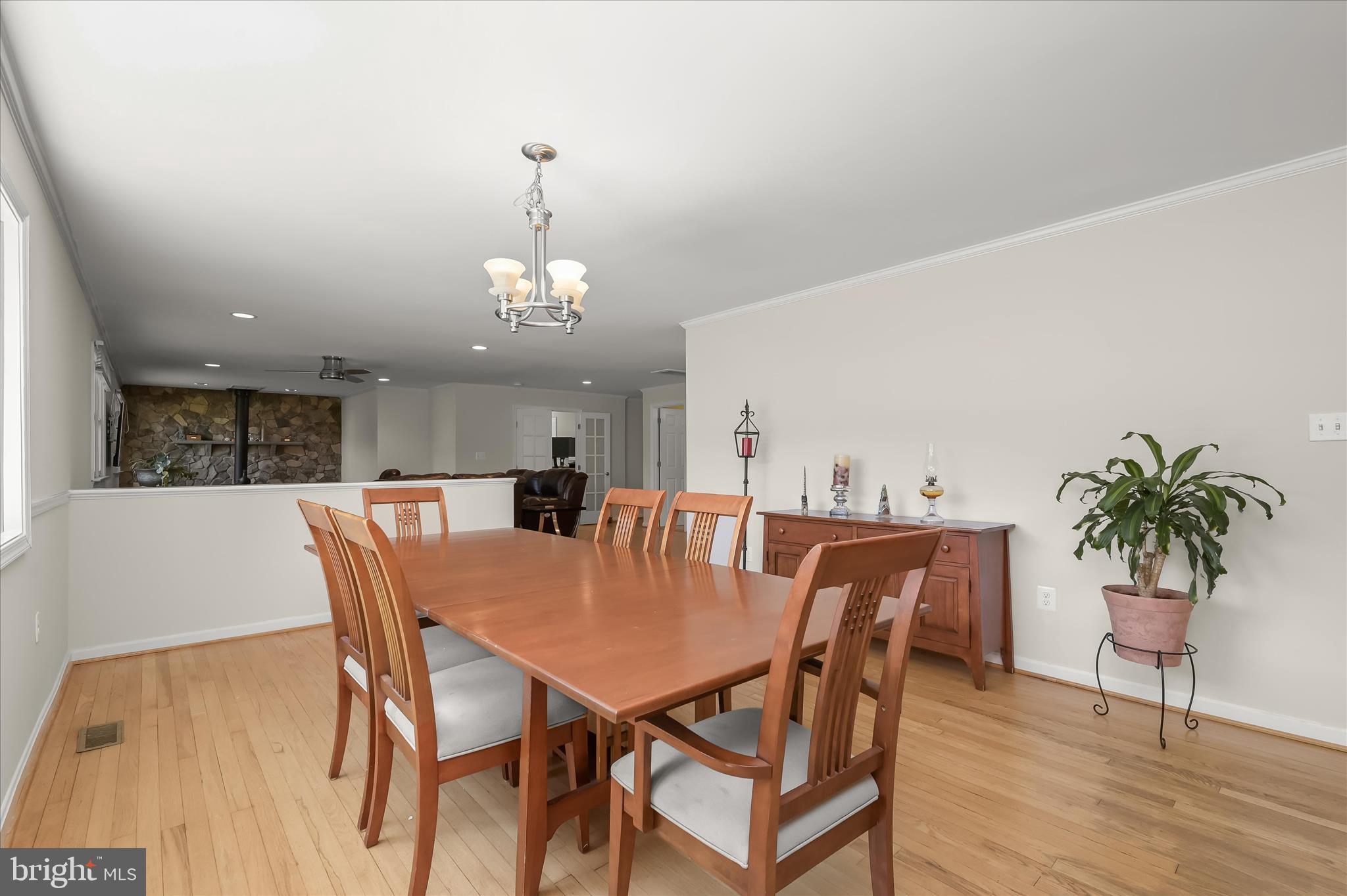 6910 Pindell School Road Clarksville, MD 21029 - Photo 9 of 73 a view of a dining room with furniture and wooden floor