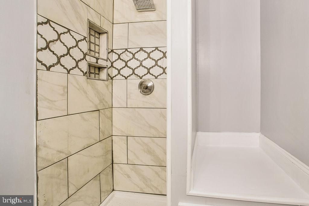 917 North Rose Street Baltimore, MD 21205 - Photo 18 of 34 a bathroom with a shower