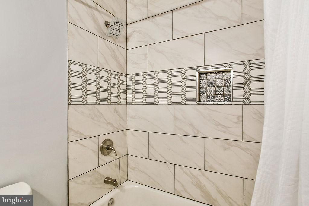 917 North Rose Street Baltimore, MD 21205 - Photo 21 of 34 a bathroom with a shower