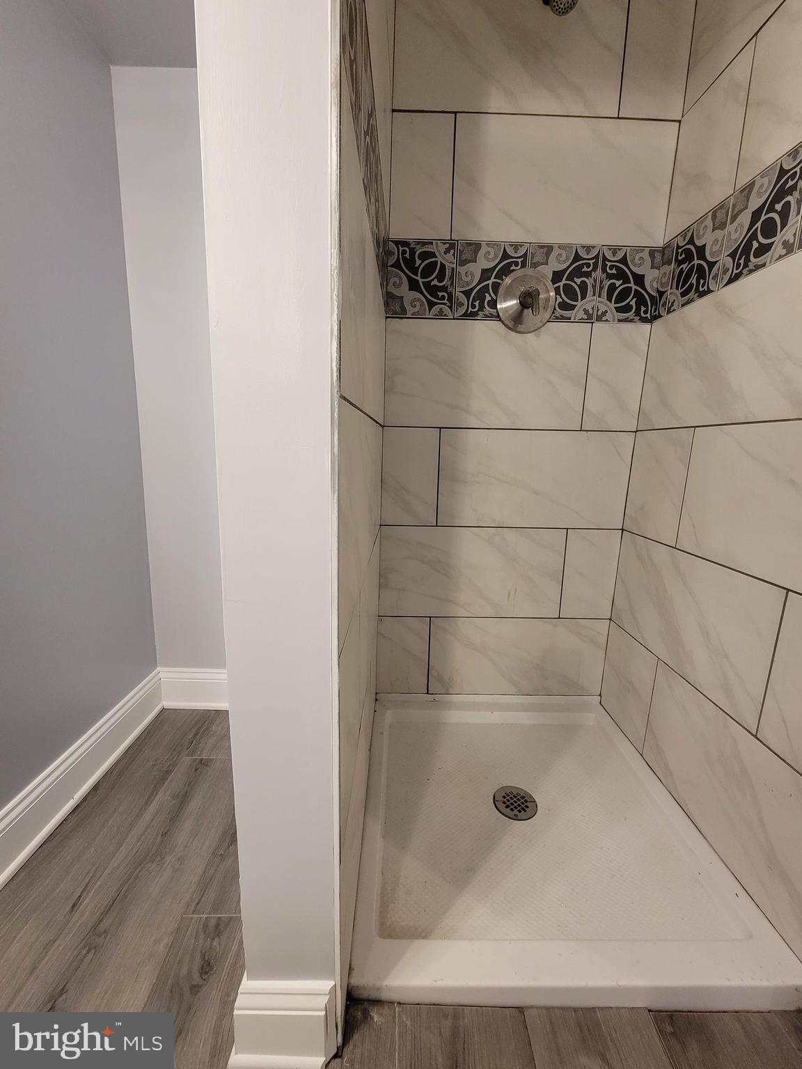 917 North Rose Street Baltimore, MD 21205 - Photo 27 of 34 a bathroom with a shower