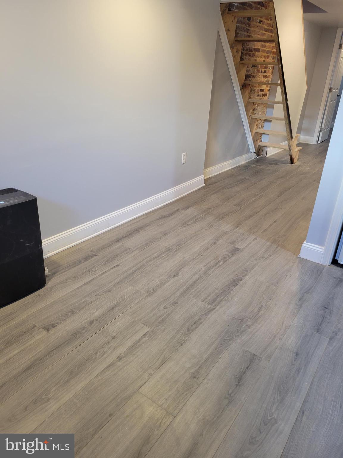 917 North Rose Street Baltimore, MD 21205 - Photo 30 of 34 wooden floor in an empty room