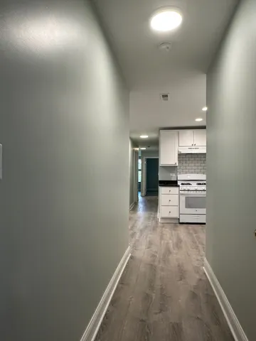a view of a kitchen with a sink