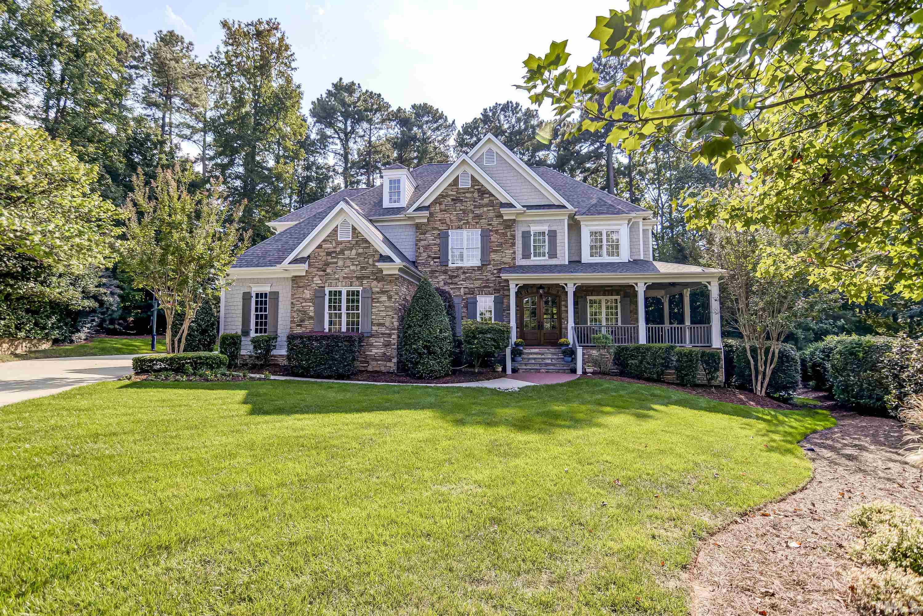 1520 Consett Court Raleigh, NC 27613 - Photo 1 of 30 a front view of a house with swimming pool having outdoor seating