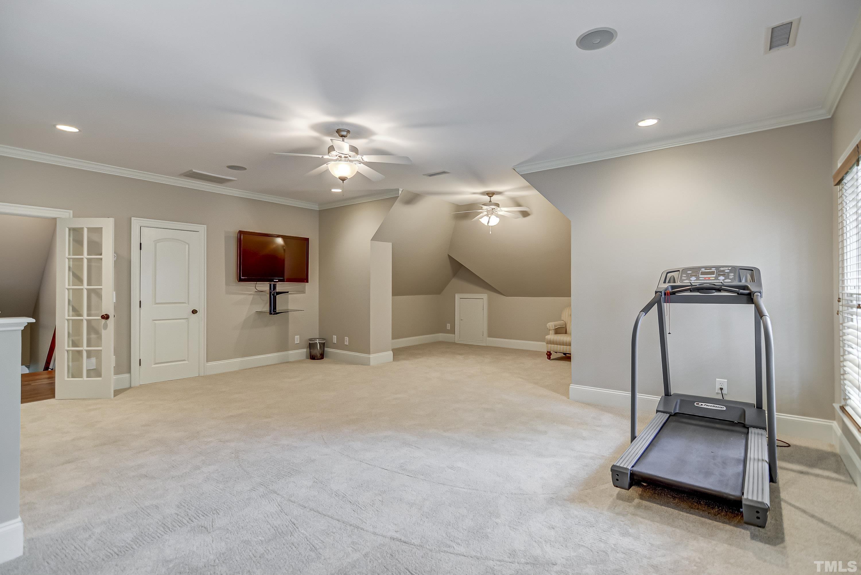 1520 Consett Court Raleigh, NC 27613 - Photo 22 of 30 a view of a room with gym equipment