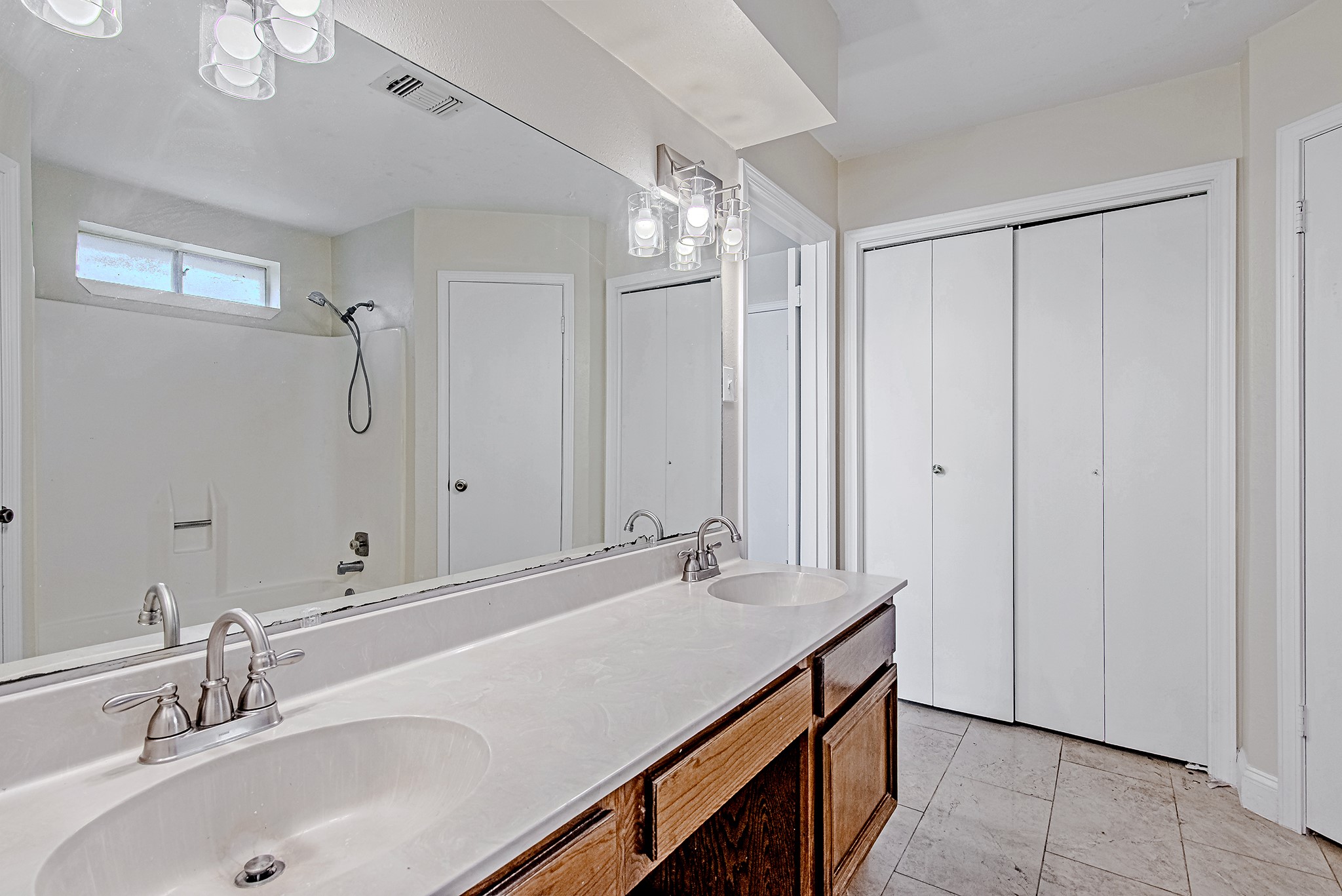 17811 Hawk Haven Lane Spring, TX 77379 - Photo 17 of 24 Additional view of the primary en suite highlighting the dual-sink vanity and abundant storage. Cabinetry and countertop have been updated since this photo was taken.