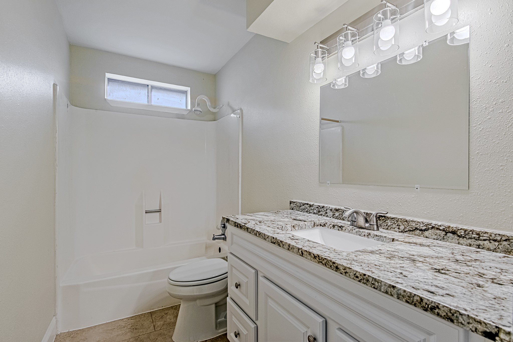 17811 Hawk Haven Lane Spring, TX 77379 - Photo 19 of 24 Hallway secondary bathroom with a vanity, tub/shower combination, and a convenient location between the secondary bedrooms to comfortably serve both rooms.