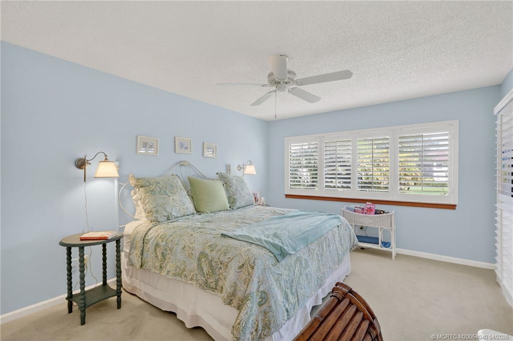 5253 Southeast Club Way Stuart, FL 34997 - Photo 20 of 65 Primary Bedroom