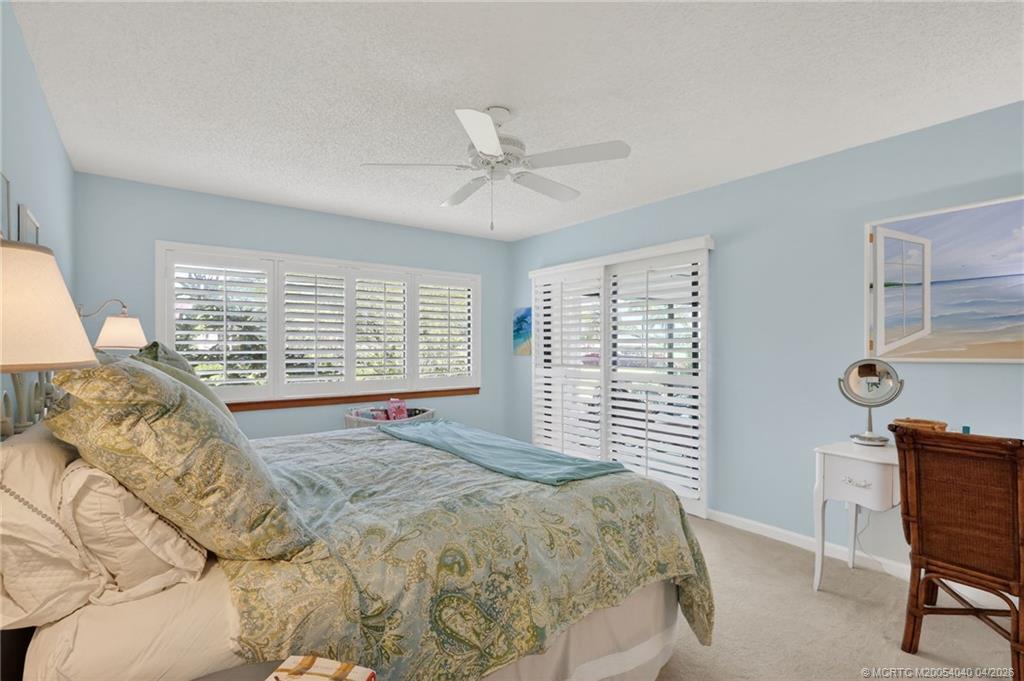5253 Southeast Club Way Stuart, FL 34997 - Photo 21 of 65 Primary Bedroom