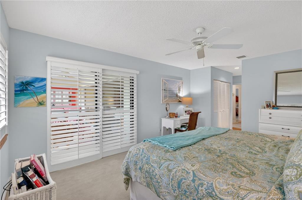 5253 Southeast Club Way Stuart, FL 34997 - Photo 23 of 65 Primary Bedroom