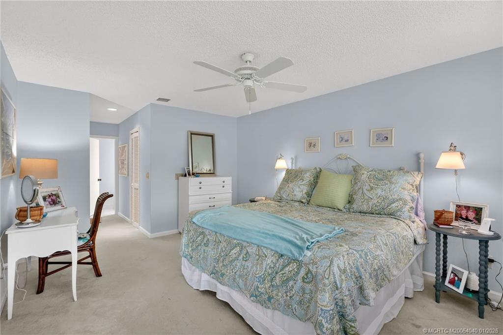 5253 Southeast Club Way Stuart, FL 34997 - Photo 23 of 66 Primary Bedroom
