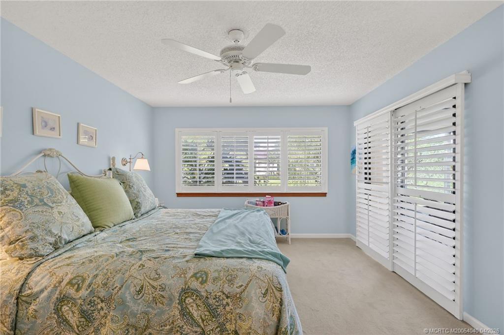 5253 Southeast Club Way Stuart, FL 34997 - Photo 24 of 65 Primary Bedroom