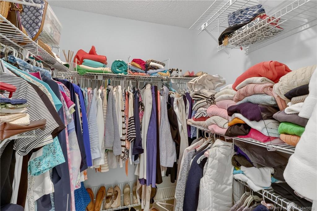5253 Southeast Club Way Stuart, FL 34997 - Photo 25 of 65 Primary Closet