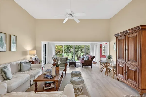 a living room with furniture or couch and a table