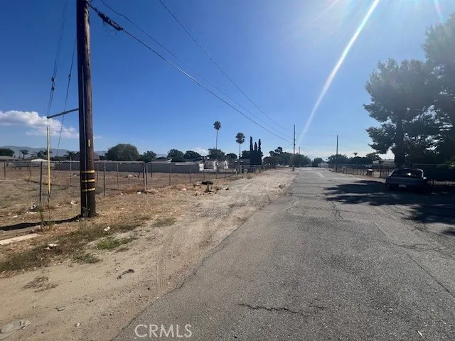 a view of a road with an outdoor space