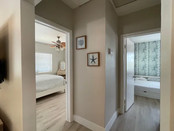 a bedroom with a bed and a view of bathroom