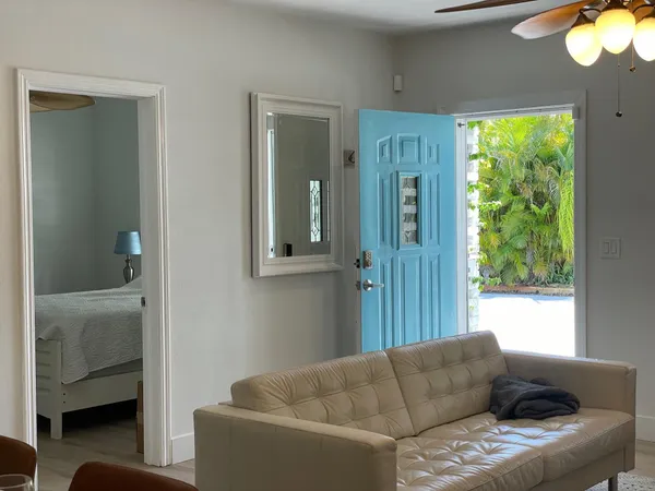 a living room with furniture and a window
