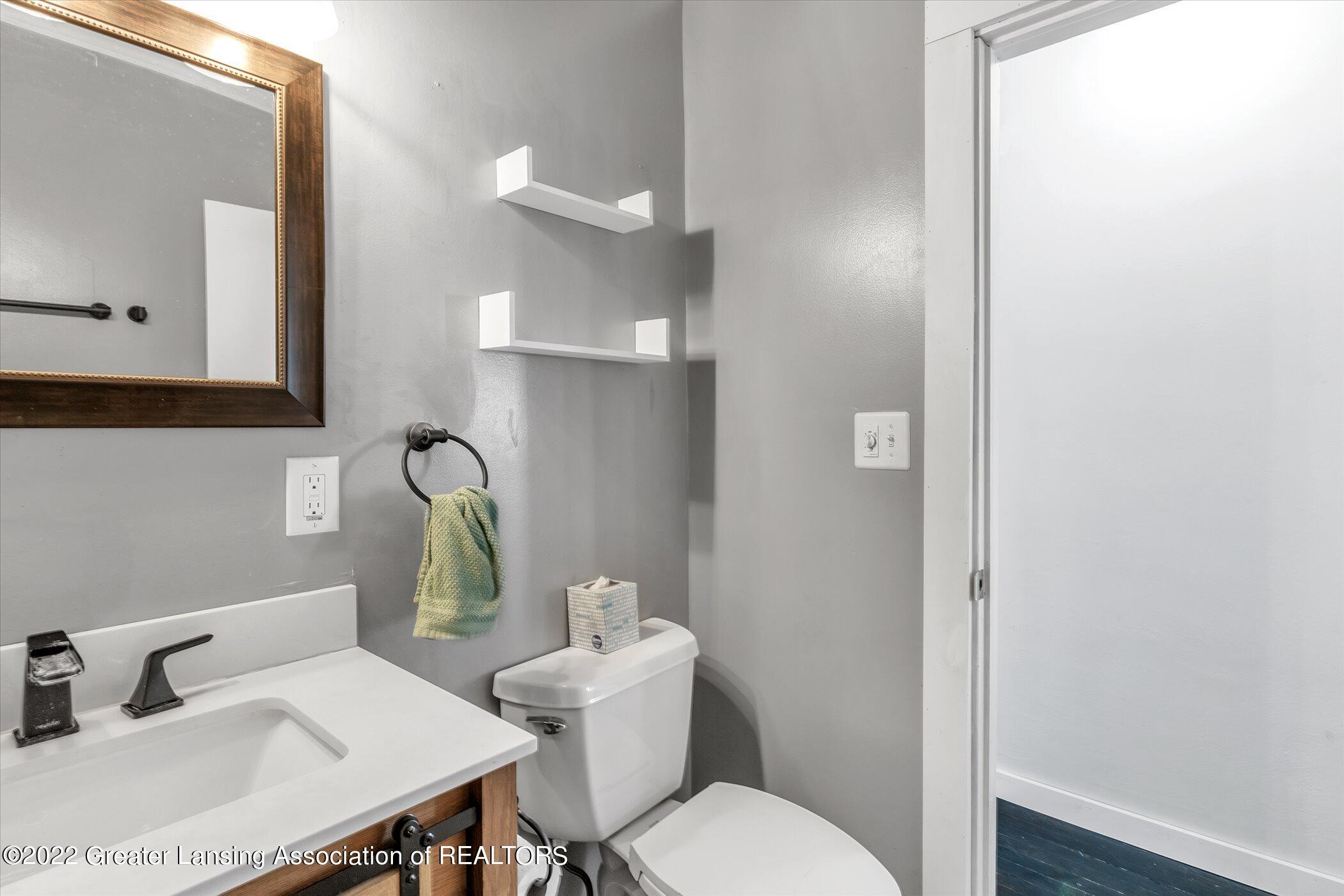 609 South Cochran Road Charlotte, MI 48813 - Photo 25 of 38 25--609-S-Cochran-Ave-WindowStill-Real-E