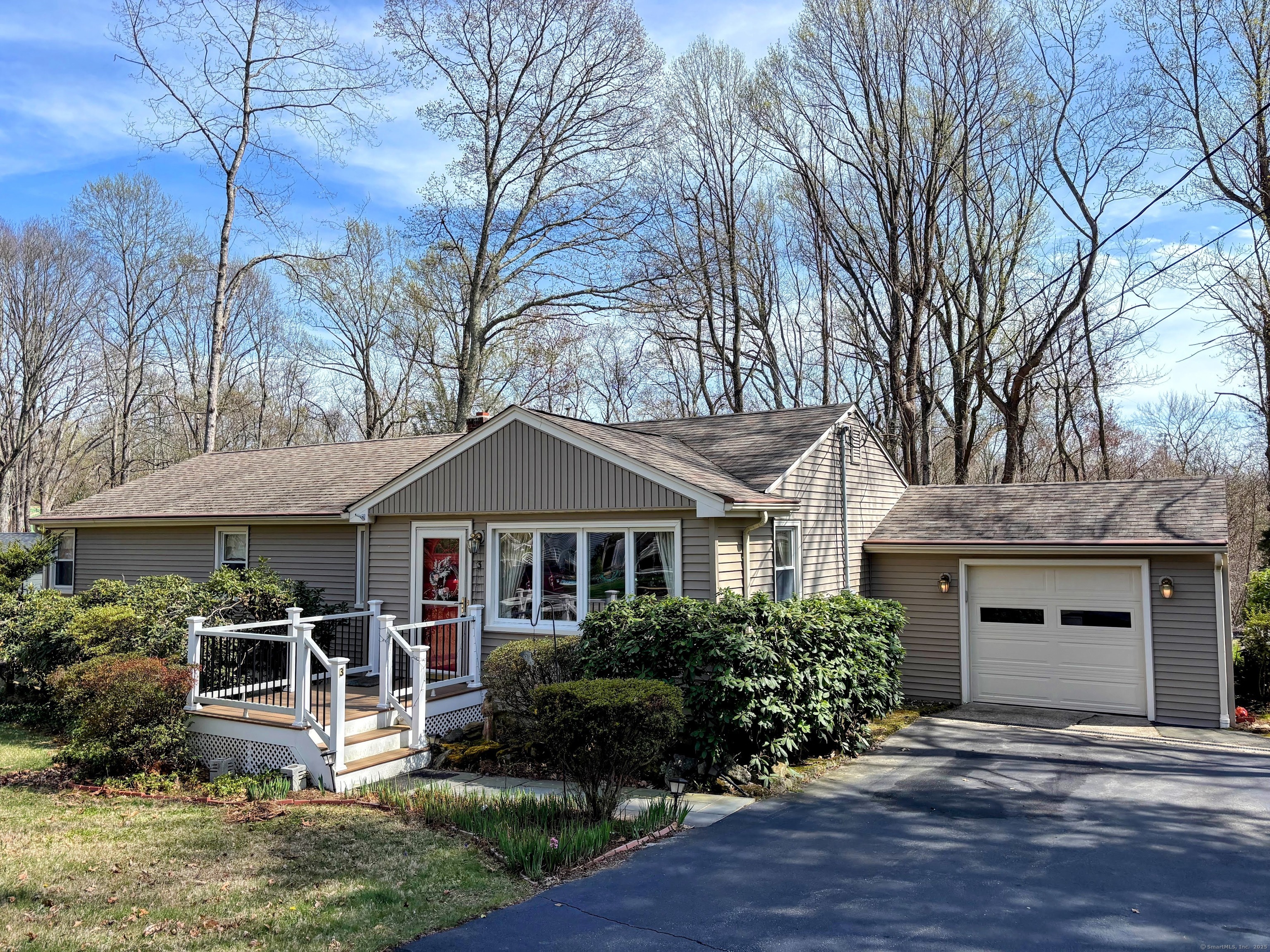 3 Deer Run Road Clinton, CT 06413 - Photo 1 of 23 a front view of a house with garden