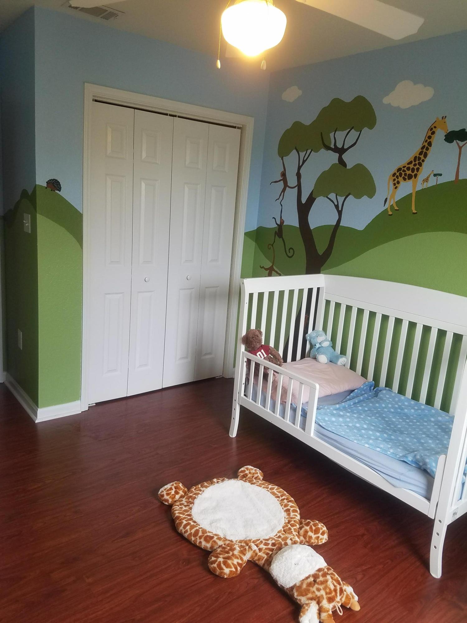 1014 Airport Road, Unit 105 Destin, FL 32541 - Photo 18 of 25 a bedroom with a bed and a window