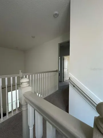 a view of balcony and wooden floor