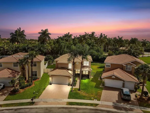 an aerial view of a house with a garden