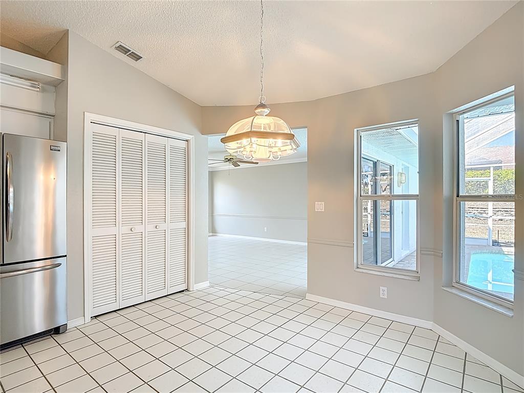1039 Greenturf Road Spring Hill, FL 34608 - Photo 21 of 60 a view of an empty room with window