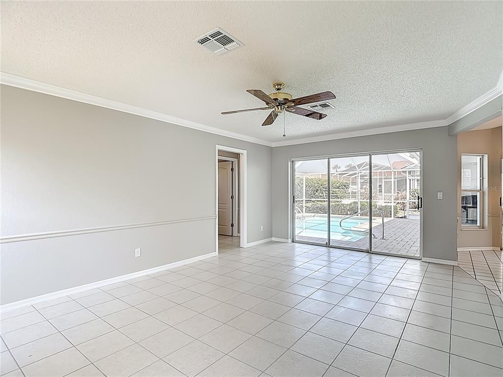 1039 Greenturf Road Spring Hill, FL 34608 - Photo 25 of 60 a view of an empty room with a window