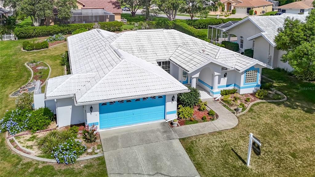 1039 Greenturf Road Spring Hill, FL 34608 - Photo 3 of 52 an aerial view of a house with yard