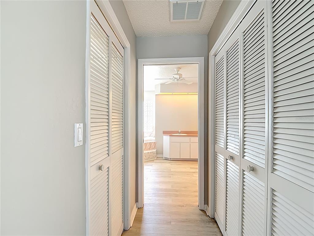 1039 Greenturf Road Spring Hill, FL 34608 - Photo 31 of 60 a view of a bathroom from the hallway