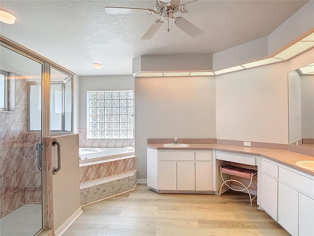 1039 Greenturf Road Spring Hill, FL 34608 - Photo 35 of 60 a view of a kitchen with a sink and cabinets