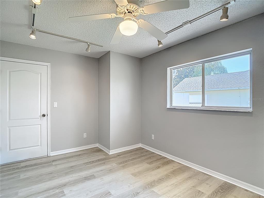 1039 Greenturf Road Spring Hill, FL 34608 - Photo 39 of 60 a view of an empty room with a window