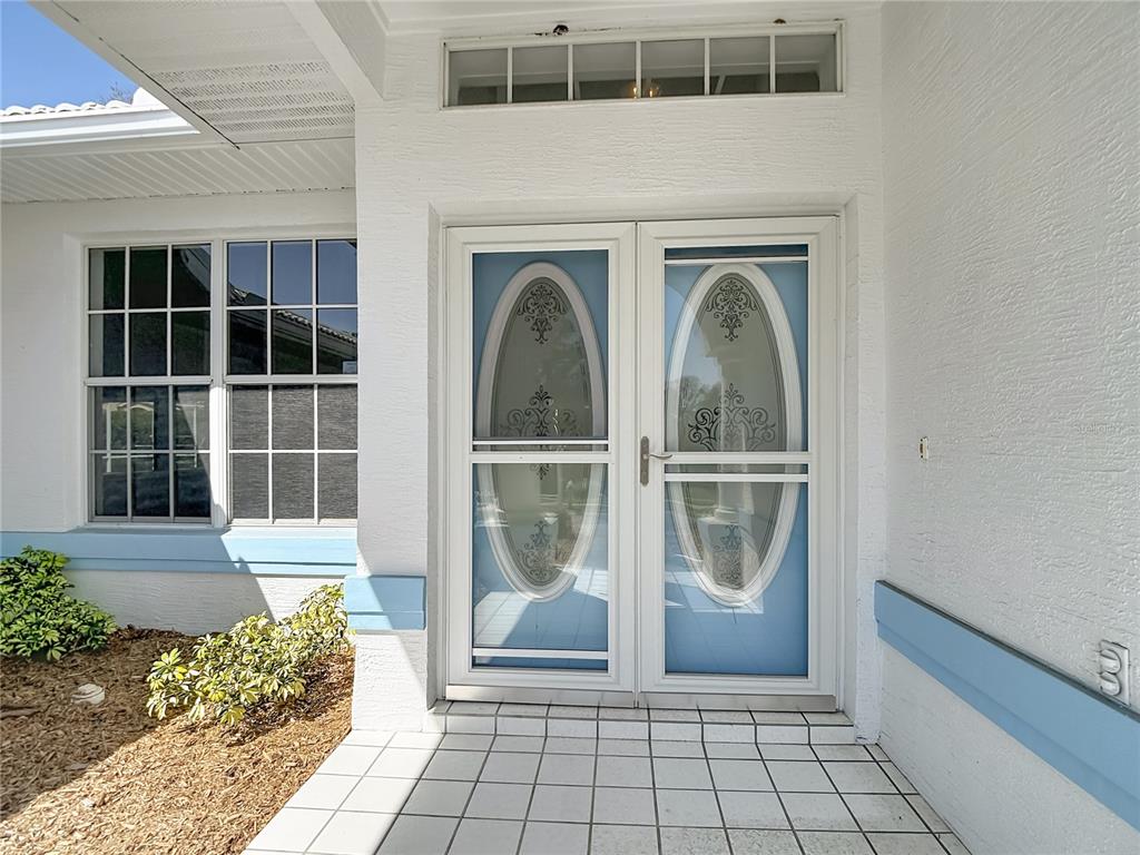 1039 Greenturf Road Spring Hill, FL 34608 - Photo 4 of 60 a view of front door of a house