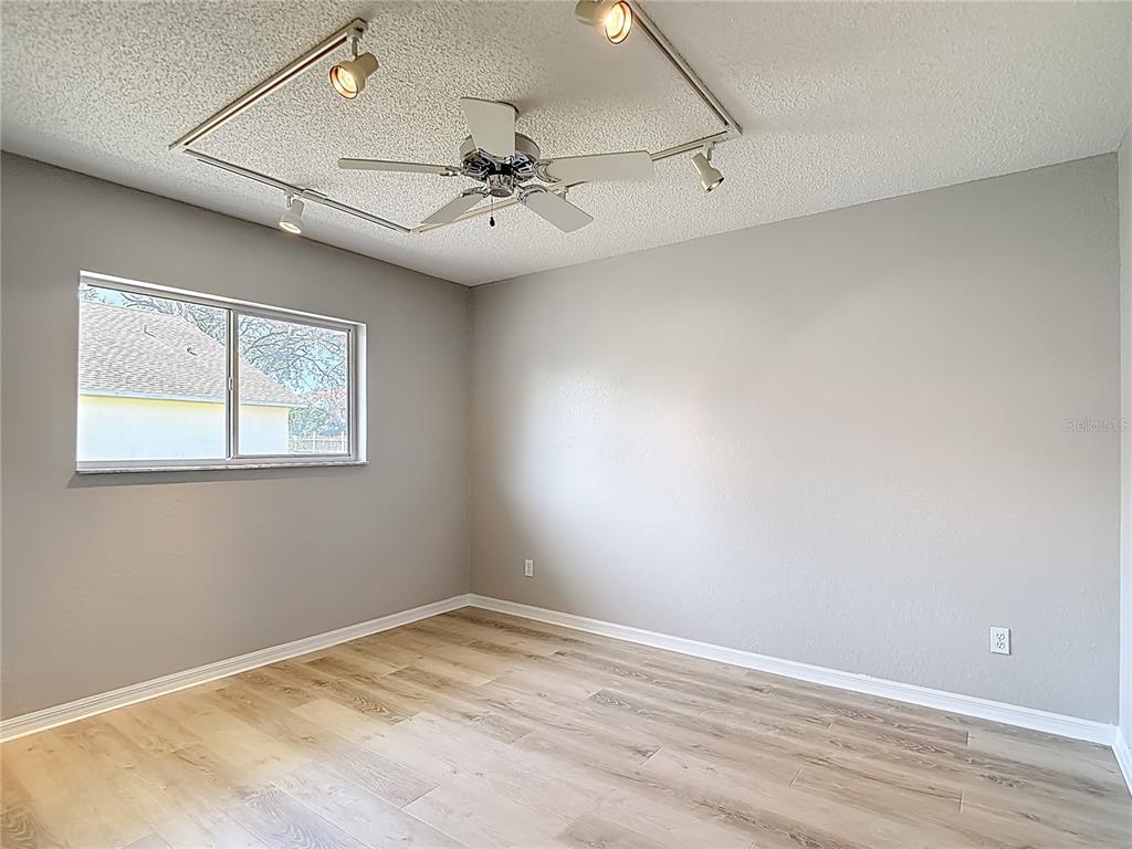 1039 Greenturf Road Spring Hill, FL 34608 - Photo 46 of 60 a view of an empty room with a window