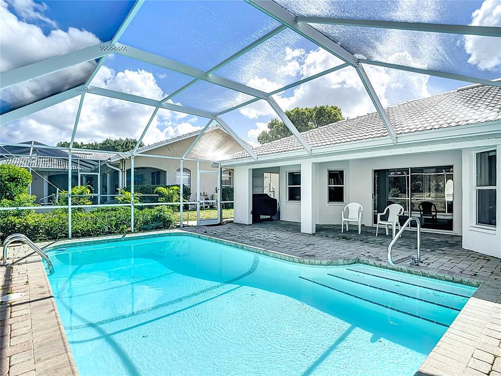 1039 Greenturf Road Spring Hill, FL 34608 - Photo 6 of 52 a front view of house with yard patio and green space