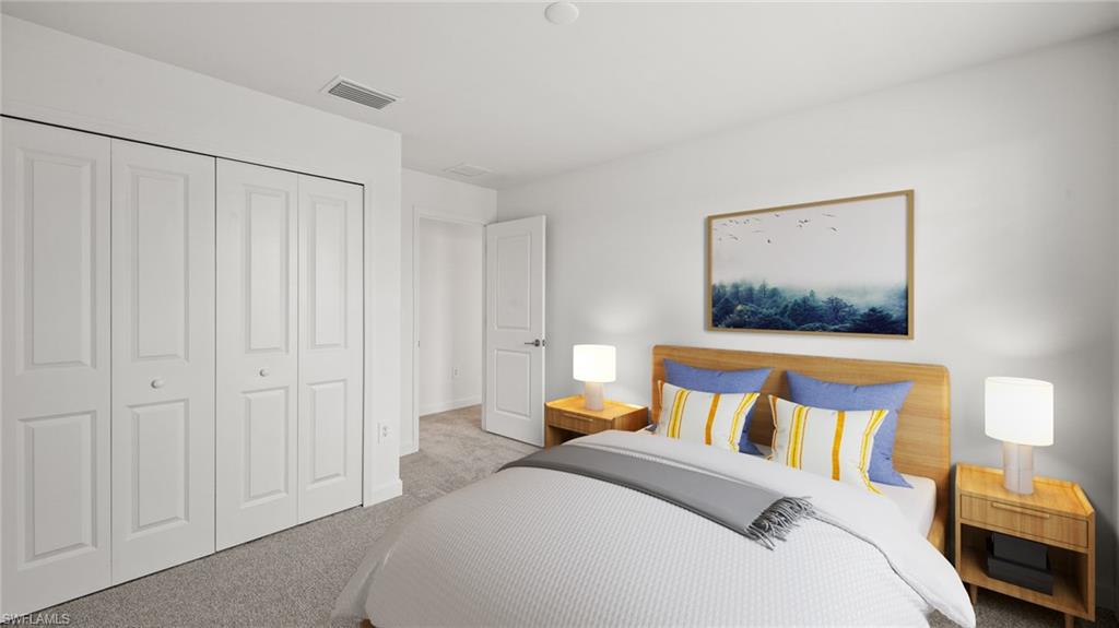21090 Verawood Loop Estero, FL 33928 - Photo 12 of 17 a bedroom with a bed and a painting on the wall