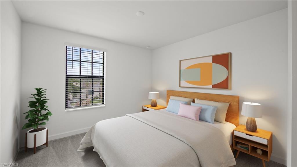 21090 Verawood Loop Estero, FL 33928 - Photo 14 of 17 a bedroom with a bed and a potted plant